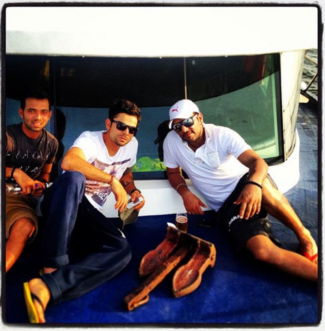 Blue buddies: Yuvraj Singh with Ajinkya Rahane and Virat Kohli on a bay trip