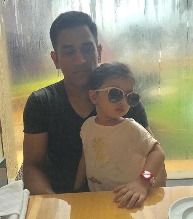 In picture: Wonder who is cooler? Daddy Dhoni or his princess Ziva