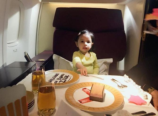 Ziva Dhoni seems to be all set for dinner time during a flight