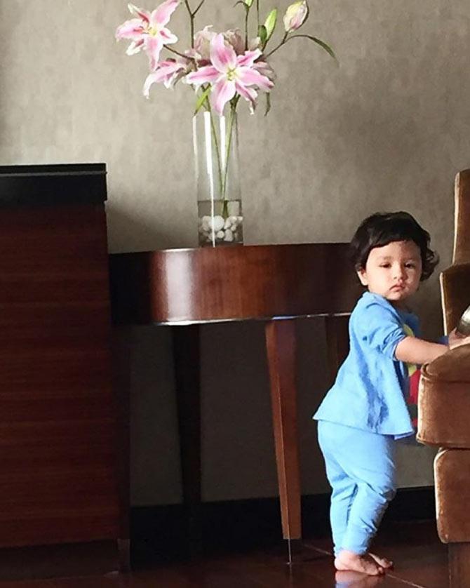 Sakshi Dhoni shared this photo of Ziva and captioned it: Oh my sleeping child the worlds so wild...but you've built your own paradise